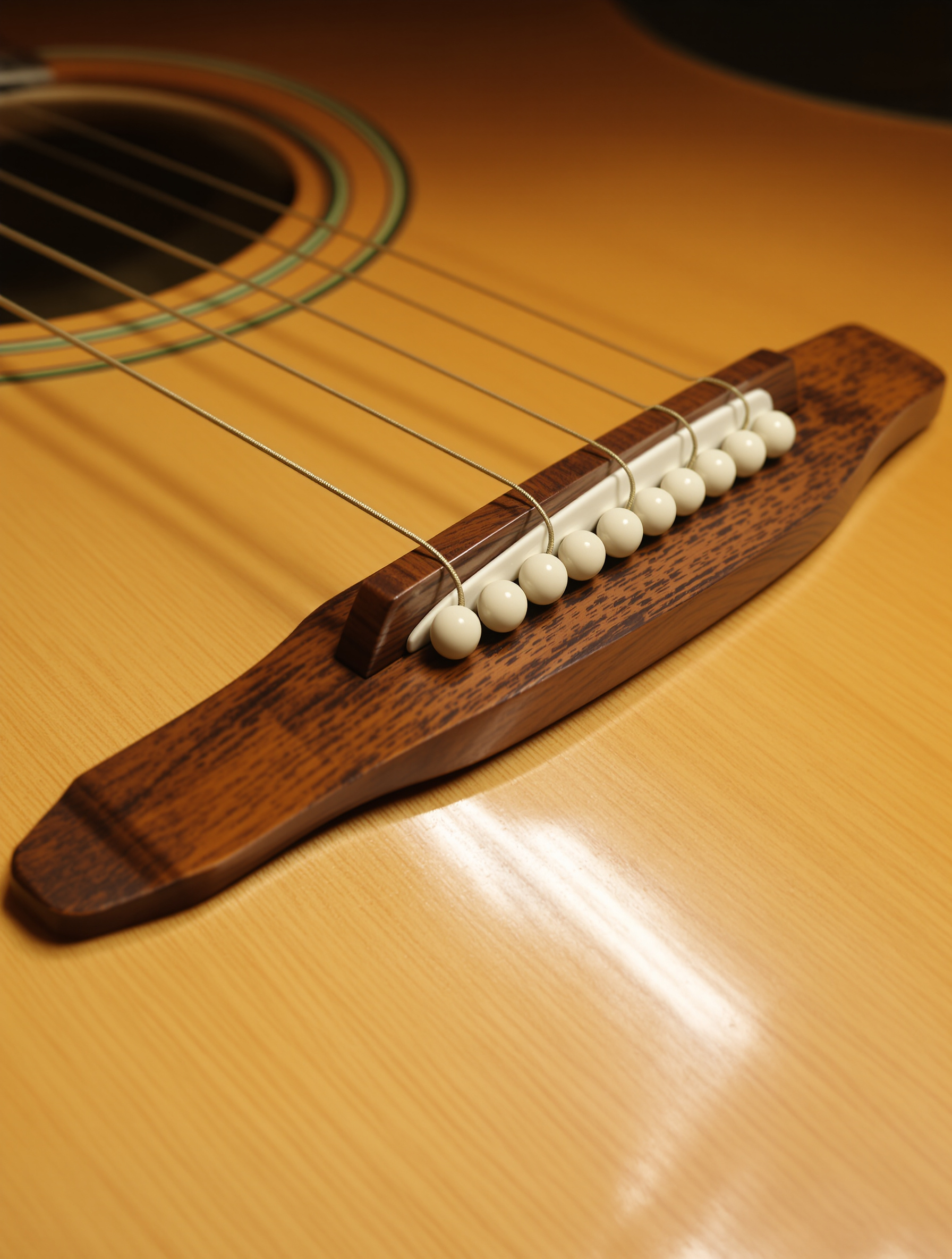 chevalet de guitare acoustique en gros plan vibrant sur une table d'harmonie